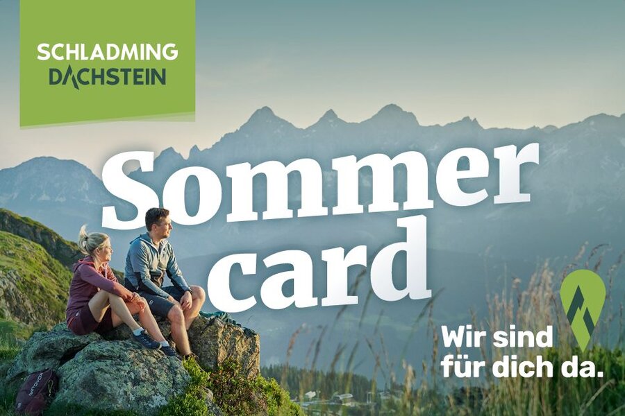 Mountain overlook with two hikers and Sommer card text