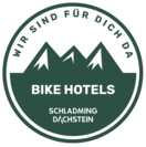 Circular badge showing mountain silhouette and Schladming Dachstein Bike Hotels
