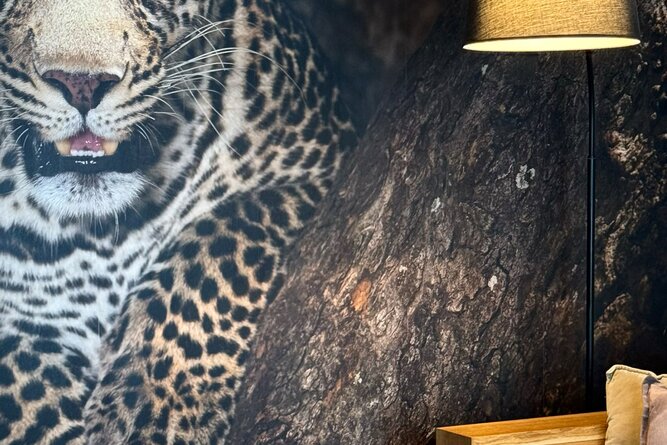 Leopard mural beside modern living room furniture